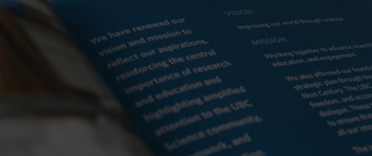A close up shot of the Vision and Mission page on the UBC Science strategic plan booklet. It is white text on dark blue. 